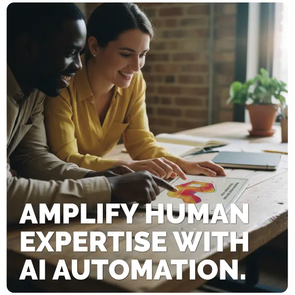 Amplify human expertise with AI automation - Two professionals collaborating with data visualization